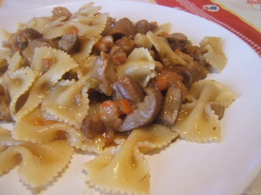 Farfalle con porcini e gamberi
