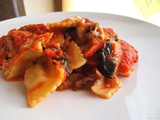 Raviolini in salsa di melanzane